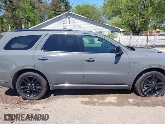 2023 Dodge Durango R/T Plus with VIN 1C4SDJCT4PC568463, listed as a IAAI auction lot 42125380 with 77,963 mi miles and . Bid and sale history available at DreamBid. Image 13.