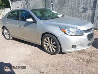 2016 Chevrolet Malibu LTZ z VIN 1G11E5SA6GF144337, wystawiony jako IAAI lot #43070502 z przebiegiem 137 777 mil mil oraz . Historia ofert i sprzedaży dostępna na DreamBid. Obrazek 1.