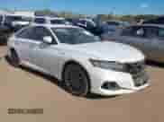 2021 Honda Accord Touring z VIN 1HGCV3F94MA005211, wystawiony jako IAAI lot #43431840 z przebiegiem 123 232 mil mil oraz . Historia ofert i sprzedaży dostępna na DreamBid. Obrazek 1.