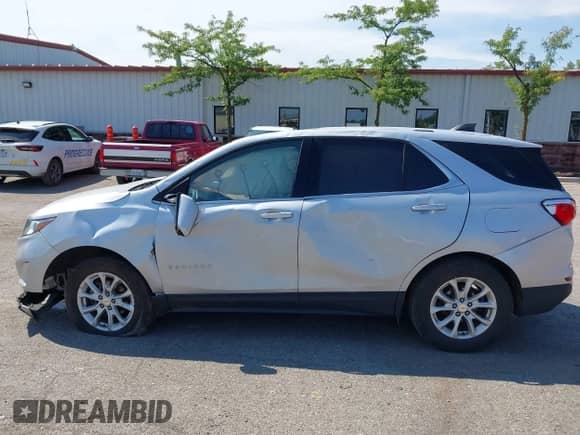 2019 Chevrolet Equinox LT z VIN 2GNAXJEV7K6230579, wystawiony jako IAAI lot #42834271 z przebiegiem 96 912 mil mil oraz . Historia ofert i sprzedaży dostępna na DreamBid. Obrazek 14.