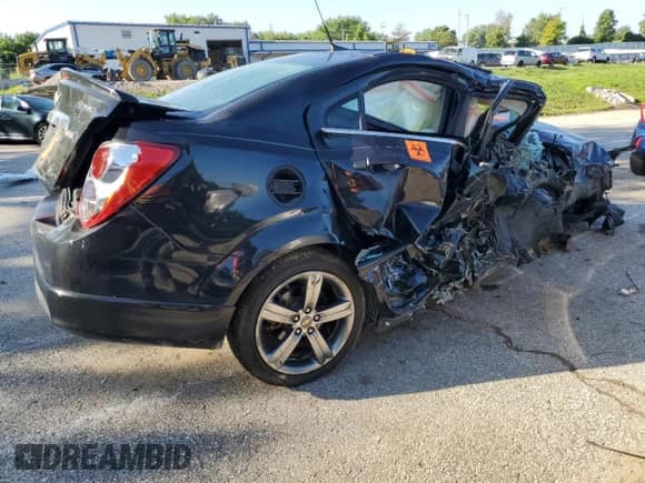 2014 Chevrolet Sonic RS с VIN 1G1JG5SB3E4193698, выставлен на аукционе Copart как лот 62303874 с пробегом 90 870 миль миль и Списание • Salvage title. История ставок и продаж доступна на DreamBid. Изображение 3.