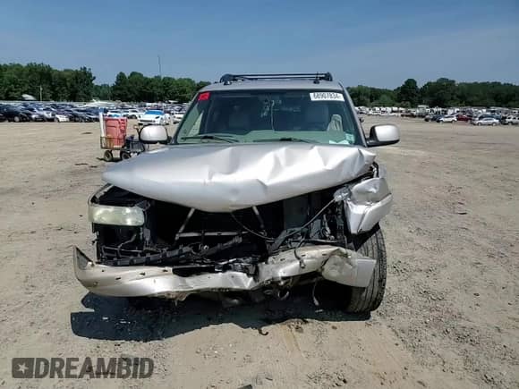 2004 Chevrolet Suburban Z71 z VIN 3GNFK16Z74G305505, wystawiony jako Copart lot #68907834 z przebiegiem Nie podano mil oraz Szkoda całkowita • Salvage title. Historia ofert i sprzedaży dostępna na DreamBid. Obrazek 11.