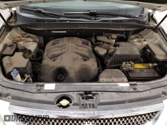 2009 Hyundai Veracruz GLS z VIN KM8NU73CX9U079459, wystawiony jako Copart lot #64781585 z przebiegiem 111 326 mil mil oraz Szkoda całkowita • Salvage title. Historia ofert i sprzedaży dostępna na DreamBid. Obrazek 12.