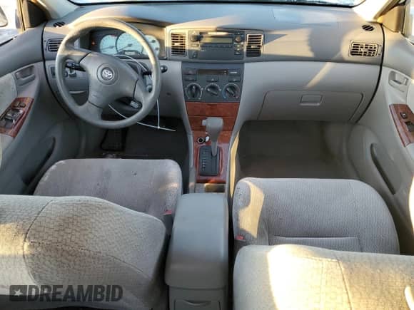 2003 Toyota Corolla CE с VIN JTDBR38E232002311, выставлен на аукционе Copart как лот 45671765 с пробегом 99 126 миль миль и Списание • Salvage title. История ставок и продаж доступна на DreamBid. Изображение 8.