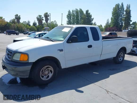 2004 Ford F-150 XL with VIN 2FTRX17W24CA28139, listed as a IAAI auction lot 42497775 with 175,189 mi miles and . Bid and sale history available at DreamBid. Image 2.