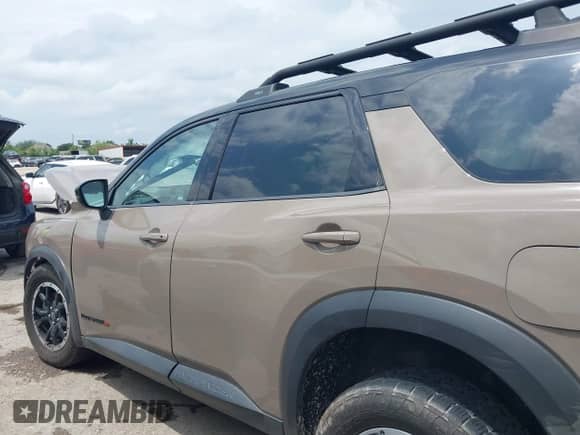 2023 Nissan Pathfinder Rock Creek with VIN 5N1DR3BD9PC228981, listed as a IAAI auction lot 42074519 with 34,763 mi miles and . Bid and sale history available at DreamBid. Image 13.