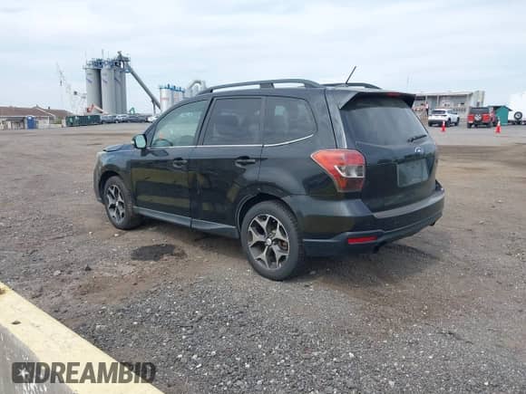 2014 Subaru Forester XT Touring z VIN JF2SJGMC1EH405328, wystawiony jako IAAI lot #43177698 z przebiegiem 156 351 mil mil oraz . Historia ofert i sprzedaży dostępna na DreamBid. Obrazek 3.
