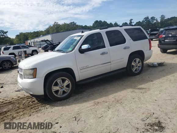 2009 Chevrolet Tahoe LTZ with VIN 1GNFK33099J126549, listed as a Copart auction lot 81409685 with 155,370 mi miles and Salvage title. Bid and sale history available at DreamBid. Image 1.