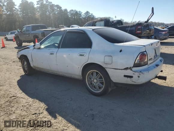 1994 Honda Accord LX z VIN 1HGCD5639RA156529, wystawiony jako Copart lot #85973584 z przebiegiem 144 699 mil mil oraz Szkoda całkowita • Salvage title. Historia ofert i sprzedaży dostępna na DreamBid. Obrazek 2.