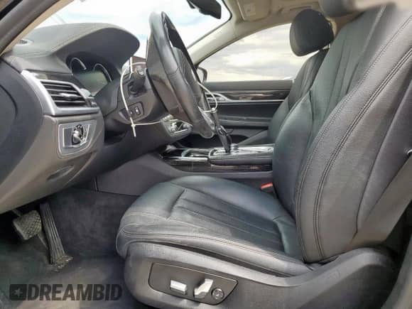 2019 BMW 7 Series 740i xDrive z VIN WBA7E4C55KGV70212, wystawiony jako Copart lot #67628615 z przebiegiem 48 408 mil mil oraz Szkoda całkowita • Salvage title. Historia ofert i sprzedaży dostępna na DreamBid. Obrazek 7.