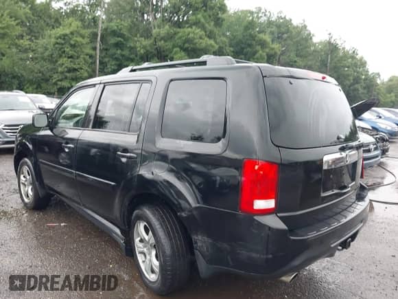 2013 Honda Pilot EX-L with VIN 5FNYF4H60DB040166, listed as a IAAI auction lot 42624940 with 216,462 mi miles and . Bid and sale history available at DreamBid. Image 6.