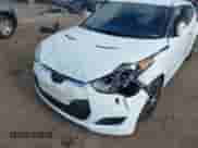 2014 Hyundai Veloster z VIN KMHTC6AD0EU204382, wystawiony jako IAAI lot #40287015 z przebiegiem 110 460 mil mil oraz . Historia ofert i sprzedaży dostępna na DreamBid. Obrazek 6.