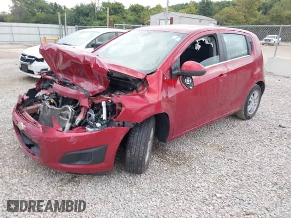 2015 Chevrolet Sonic LT with VIN 1G1JC6SH9F4113781, listed as a IAAI auction lot 43111610 with 70,632 mi miles and . Bid and sale history available at DreamBid. Image 2.