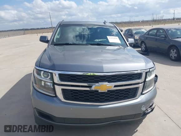 2019 Chevrolet Tahoe LS with VIN 1GNSKAKC7KR347704, listed as a IAAI auction lot 41532849 with 219,466 mi miles and . Bid and sale history available at DreamBid. Image 12.