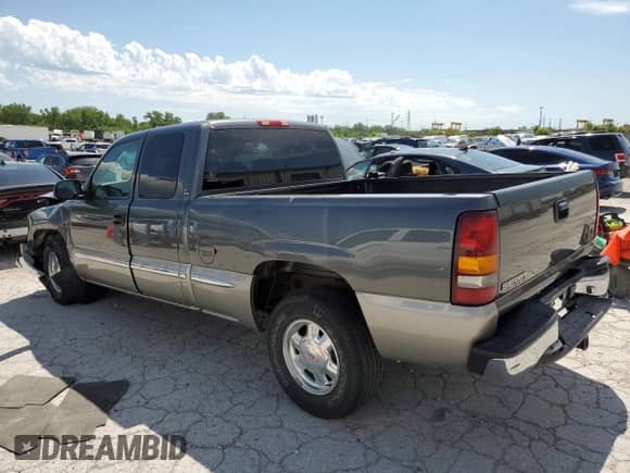 2000 GMC Sierra 1500 SLE with VIN 1GTEC19V3YZ352742, listed as a Copart auction lot 57746955 with 194,947 mi miles and Salvage title. Bid and sale history available at DreamBid. Image 2.