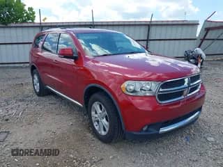 2011 Dodge Durango Crew with VIN 1D4RD4GG8BC634392, listed as a IAAI auction lot 42552266 with 166,166 mi miles and . Bid and sale history available at DreamBid. Image 1.