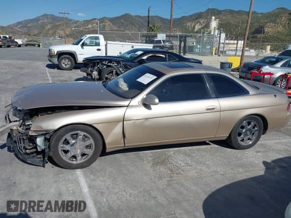 1996 Lexus SC 400 с VIN JT8CH32Y9T0051509, выставлен на аукционе IAAI как лот 42223273 с пробегом 194 510 миль миль и . История ставок и продаж доступна на DreamBid. Изображение 14.