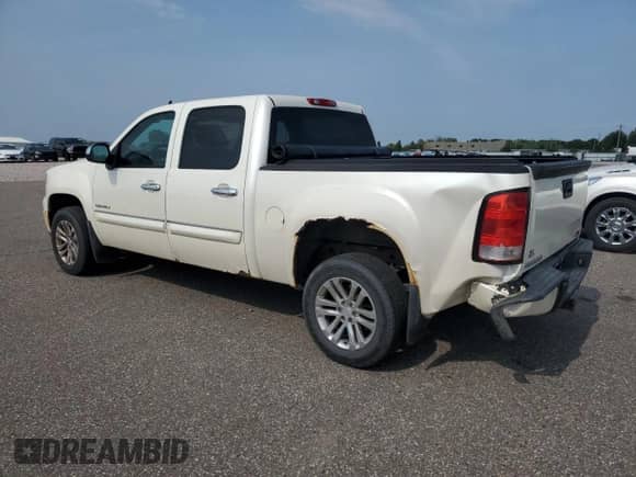 2013 GMC Sierra 1500 Denali with VIN 3GTP2XE20DG309190, listed as a Copart auction lot 71746495 with 192,231 mi miles and Salvage title. Bid and sale history available at DreamBid. Image 2.