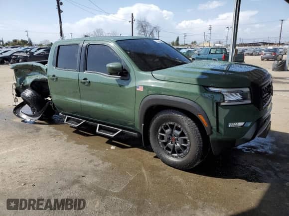 2023 Nissan Frontier Pro-X with VIN 1N6ED1EJ6PN670843, listed as a Copart auction lot 51841865 with 8,825 mi miles and Salvage title. Bid and sale history available at DreamBid. Image 4.