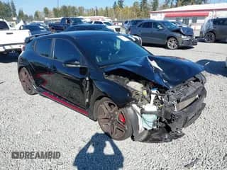 2021 Hyundai Veloster z VIN KMHT36AH2MU008798, wystawiony jako IAAI lot #43306172 z przebiegiem 63 538 mil mil oraz . Historia ofert i sprzedaży dostępna na DreamBid. Obrazek 1.