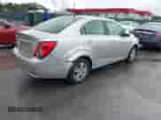2014 Chevrolet Sonic LT с VIN 1G1JD5SHXE4207495, выставлен на аукционе IAAI как лот 42313153 с пробегом 110 015 миль миль и . История ставок и продаж доступна на DreamBid. Изображение 4.