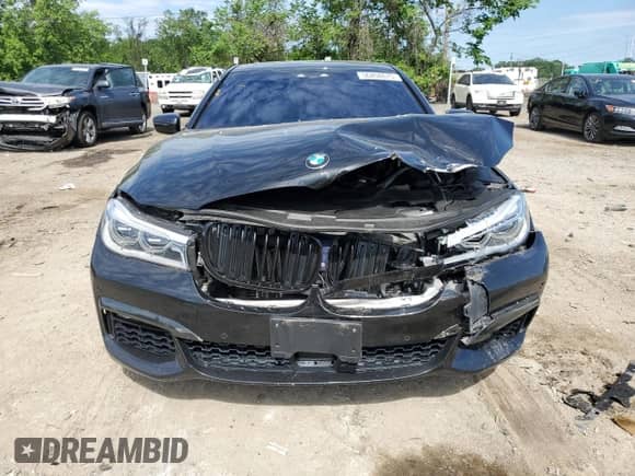 2019 BMW 7 Series 750i xDrive with VIN WBA7B0C54KG527501, listed as a Copart auction lot 56208675 with 34,471 mi miles and Salvage title. Bid and sale history available at DreamBid. Image 5.