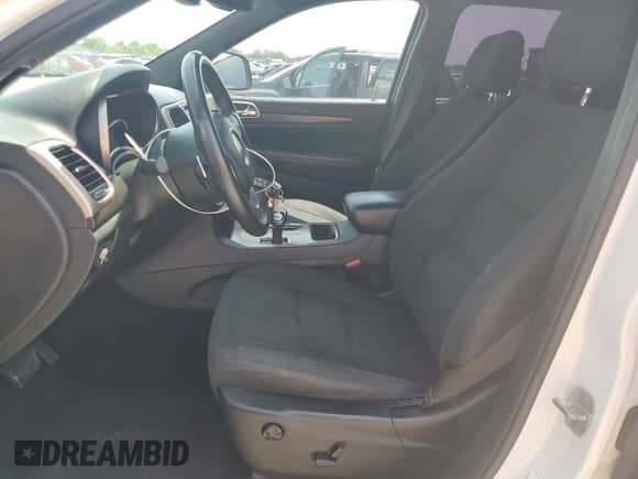 2014 Jeep Grand Cherokee Laredo with VIN 1C4RJEAGXEC157778, listed as a Copart auction lot 65999535 with 124,804 mi miles and Salvage title. Bid and sale history available at DreamBid. Image 7.