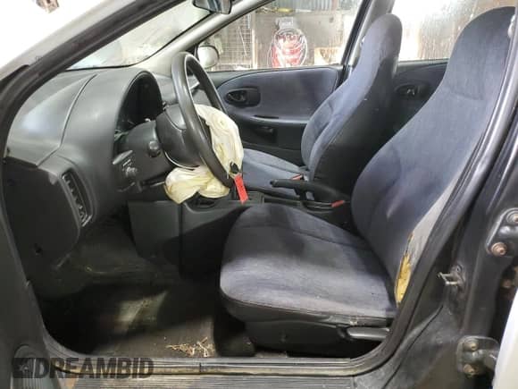 1999 Saturn SL with VIN 1G8ZH528XXZ235067, listed as a Copart auction lot 74508564 with 155,180 mi miles and Salvage title. Bid and sale history available at DreamBid. Image 7.