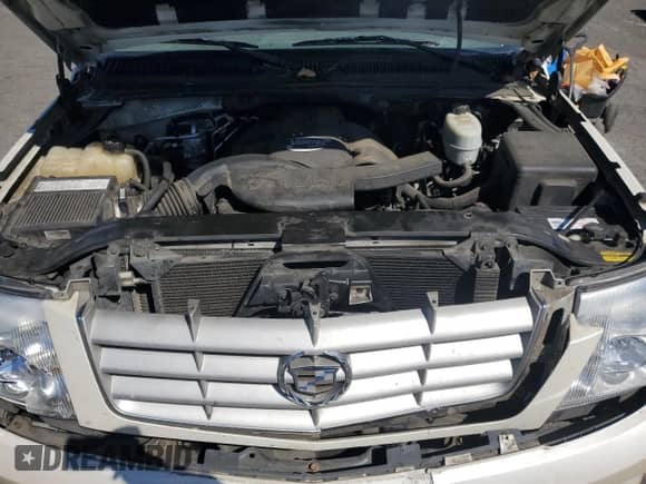 2005 Cadillac Escalade с VIN 1GYEK63NX5R236145, выставлен на аукционе Copart как лот 66621785 с пробегом 247 643 миль миль и Списание • Salvage title. История ставок и продаж доступна на DreamBid. Изображение 11.