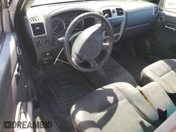 2012 Chevrolet Colorado Work Truck z VIN 1GCCSBF93C8161165, wystawiony jako Copart lot #66984145 z przebiegiem 190 030 mil mil oraz Czysty tytuł • Clean title. Historia ofert i sprzedaży dostępna na DreamBid. Obrazek 8.