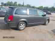 2012 Dodge Grand Caravan SXT with VIN 2C4RDGCG5CR294986, listed as a IAAI auction lot 42804374 with 183,596 mi miles and . Bid and sale history available at DreamBid. Image 4.