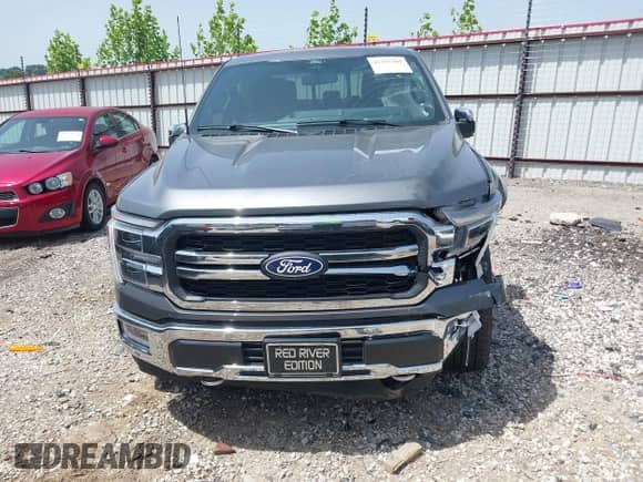 2024 Ford F-150 Lariat z VIN 1FTFW5L57RFB58262, wystawiony jako IAAI lot #42255702 z przebiegiem 4 763 mil mil oraz . Historia ofert i sprzedaży dostępna na DreamBid. Obrazek 12.