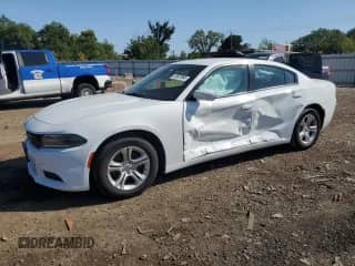 2019 Dodge Charger SXT with VIN 2C3CDXBG3KH591643, listed as a Copart auction lot 81821895 with 125,927 mi miles and Salvage title. Bid and sale history available at DreamBid. Image 1.