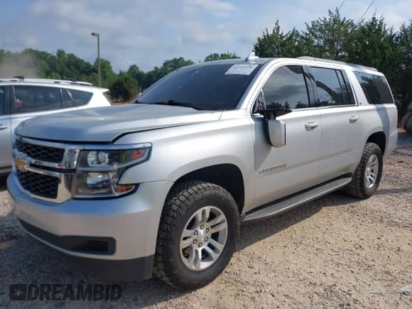 2020 Chevrolet Suburban LT with VIN 1GNSKHKCXLR258283, listed as a IAAI auction lot 42735336 with 178,697 mi miles and . Bid and sale history available at DreamBid. Image 2.