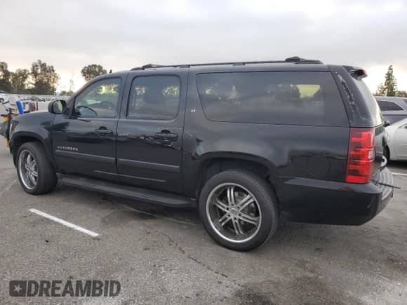2009 Chevrolet Suburban 2LT с VIN 1GNFC26089R196628, выставлен на аукционе Copart как лот 80308515 с пробегом 279 976 миль миль и Списание • Salvage title. История ставок и продаж доступна на DreamBid. Изображение 2.