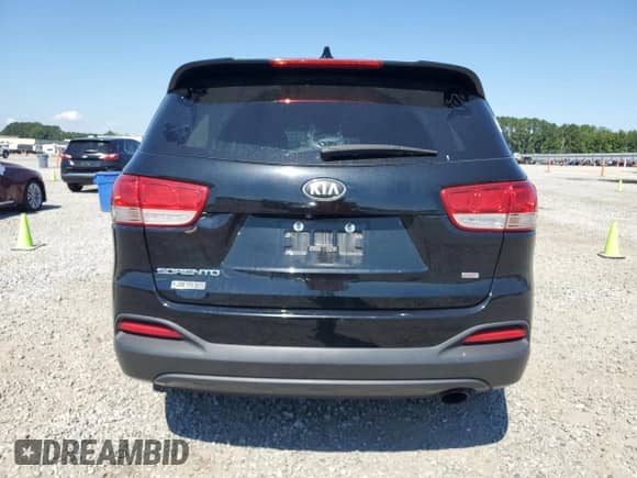 2018 Kia Sorento LX z VIN 5XYPG4A38JG396068, wystawiony jako Copart lot #70809795 z przebiegiem 88 765 mil mil oraz Szkoda całkowita • Salvage title. Historia ofert i sprzedaży dostępna na DreamBid. Obrazek 6.