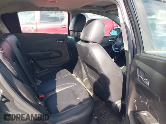 2013 Chevrolet Sonic LTZ with VIN 1G1JE6SB1D4129735, listed as a IAAI auction lot 41739740 with 116,049 mi miles and . Bid and sale history available at DreamBid. Image 8.