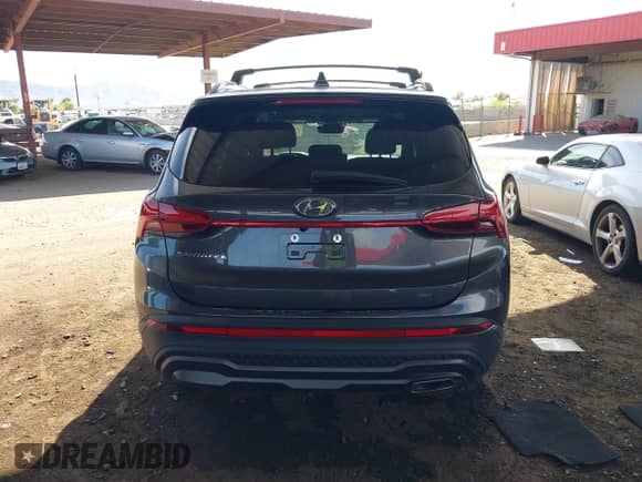 2022 Hyundai Santa Fe XRT z VIN 5NMS64AJ4NH383194, wystawiony jako IAAI lot #43270179 z przebiegiem 28 393 mil mil oraz . Historia ofert i sprzedaży dostępna na DreamBid. Obrazek 16.