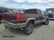 1998 Chevrolet Silverado 2500 с VIN 1GCGK29R0WE209238, выставлен на аукционе Copart как лот 65289165 с пробегом 141 791 миль миль и Списание • Salvage title. История ставок и продаж доступна на DreamBid. Изображение 3.