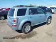 2008 Mercury Mariner with VIN 4M2CU91198KJ24730, listed as a IAAI auction lot 43341107 with 158,521 mi miles and . Bid and sale history available at DreamBid. Image 4.