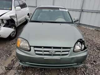 2003 Hyundai Accent GL с VIN KMHCG35C23U264701, выставлен на аукционе Copart как лот 80029154 с пробегом 142 090 миль миль и Списание • Salvage title. История ставок и продаж доступна на DreamBid. Изображение 5.