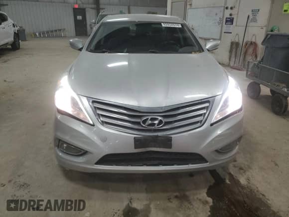 2012 Hyundai Azera с VIN KMHFG4JG2CA183114, выставлен на аукционе Copart как лот 82852674 с пробегом 169 546 миль миль и Списание • Salvage title. История ставок и продаж доступна на DreamBid. Изображение 5.