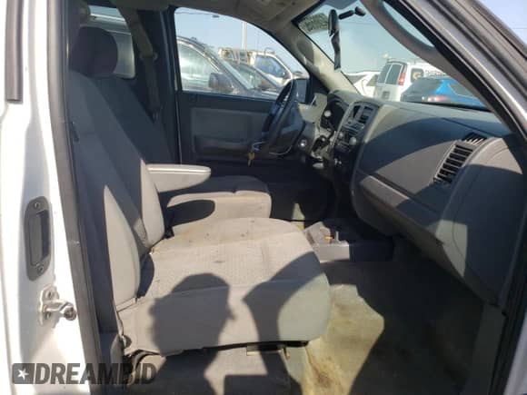 2007 Dodge Dakota z VIN 1D7HW22P07S176624, wystawiony jako Copart lot #68370994 z przebiegiem 284 863 mil mil oraz Szkoda całkowita • Salvage title. Historia ofert i sprzedaży dostępna na DreamBid. Obrazek 5.