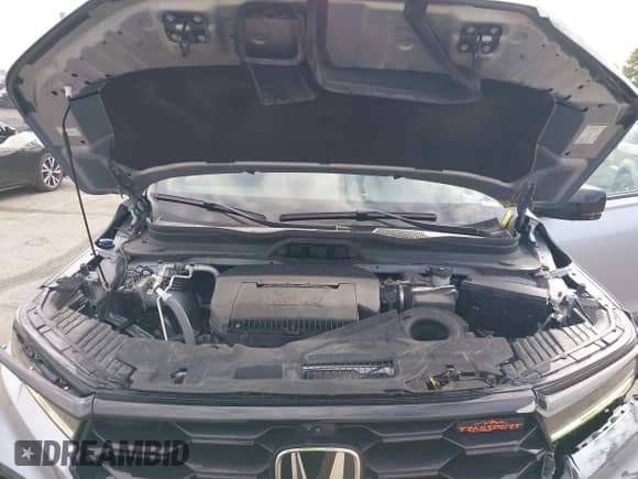 2023 Honda Pilot TrailSport z VIN 5FNYG1H6XPB050977, wystawiony jako IAAI lot #43457156 z przebiegiem 139 595 mil mil oraz . Historia ofert i sprzedaży dostępna na DreamBid. Obrazek 10.