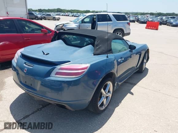 2007 Saturn Sky with VIN 1G8MB35B97Y120635, listed as a IAAI auction lot 42697463 with 214,759 mi miles and . Bid and sale history available at DreamBid. Image 4.