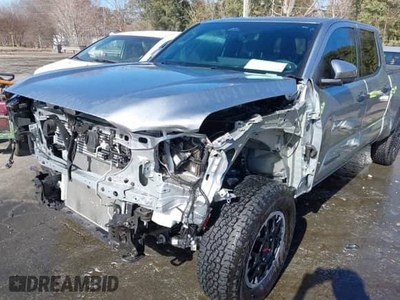 2024 Toyota Tacoma SR5 with VIN 3TMLB5JN4RM022026, listed as a IAAI auction lot 41409069 with 20,354 mi miles and . Bid and sale history available at DreamBid. Image 6.