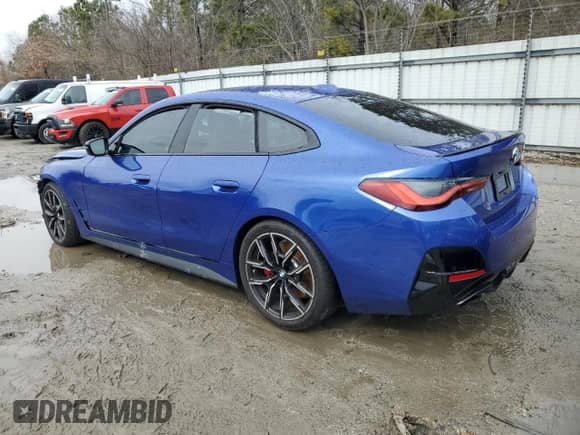 2024 BMW 4 Series M440i with VIN WBA63AW01RFR21066, listed as a Copart auction lot 44224145 with 12,943 mi miles and Salvage title. Bid and sale history available at DreamBid. Image 2.