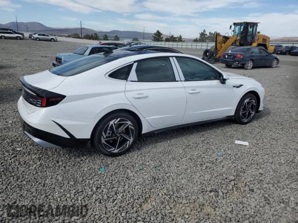 2025 Hyundai Sonata SEL Convenience с VIN KMHL14JA6SA503596, выставлен на аукционе Copart как лот 64952745 с пробегом 12 миль миль и Списание • Salvage title. История ставок и продаж доступна на DreamBid. Изображение 3.