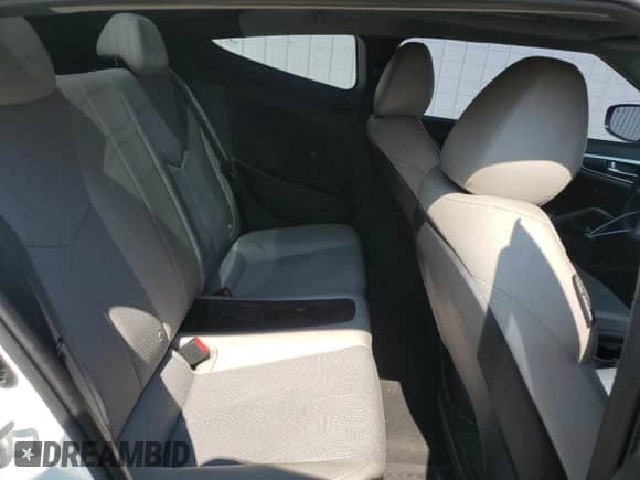 2013 Hyundai Veloster w/Black Int z VIN KMHTC6AD2DU099052, wystawiony jako Copart lot #60487975 z przebiegiem 126 762 mil mil oraz Czysty tytuł • Clean title. Historia ofert i sprzedaży dostępna na DreamBid. Obrazek 10.