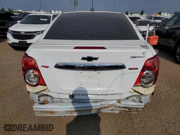 2015 Chevrolet Sonic RS with VIN 1G1JH5SB7F4111275, listed as a Copart auction lot 65477305 with 72,983 mi miles and Salvage title. Bid and sale history available at DreamBid. Image 6.